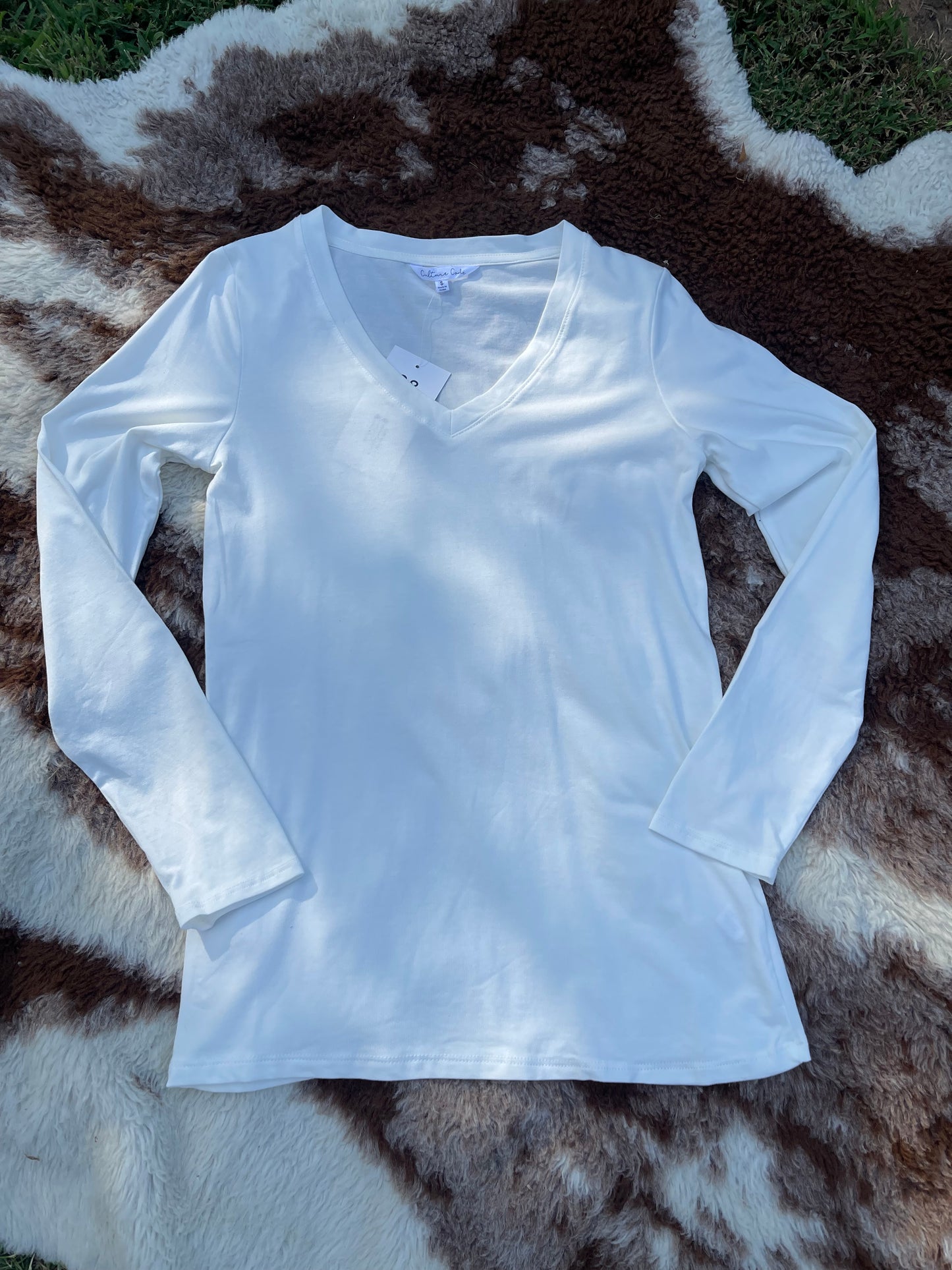 White long sleeved v-neck