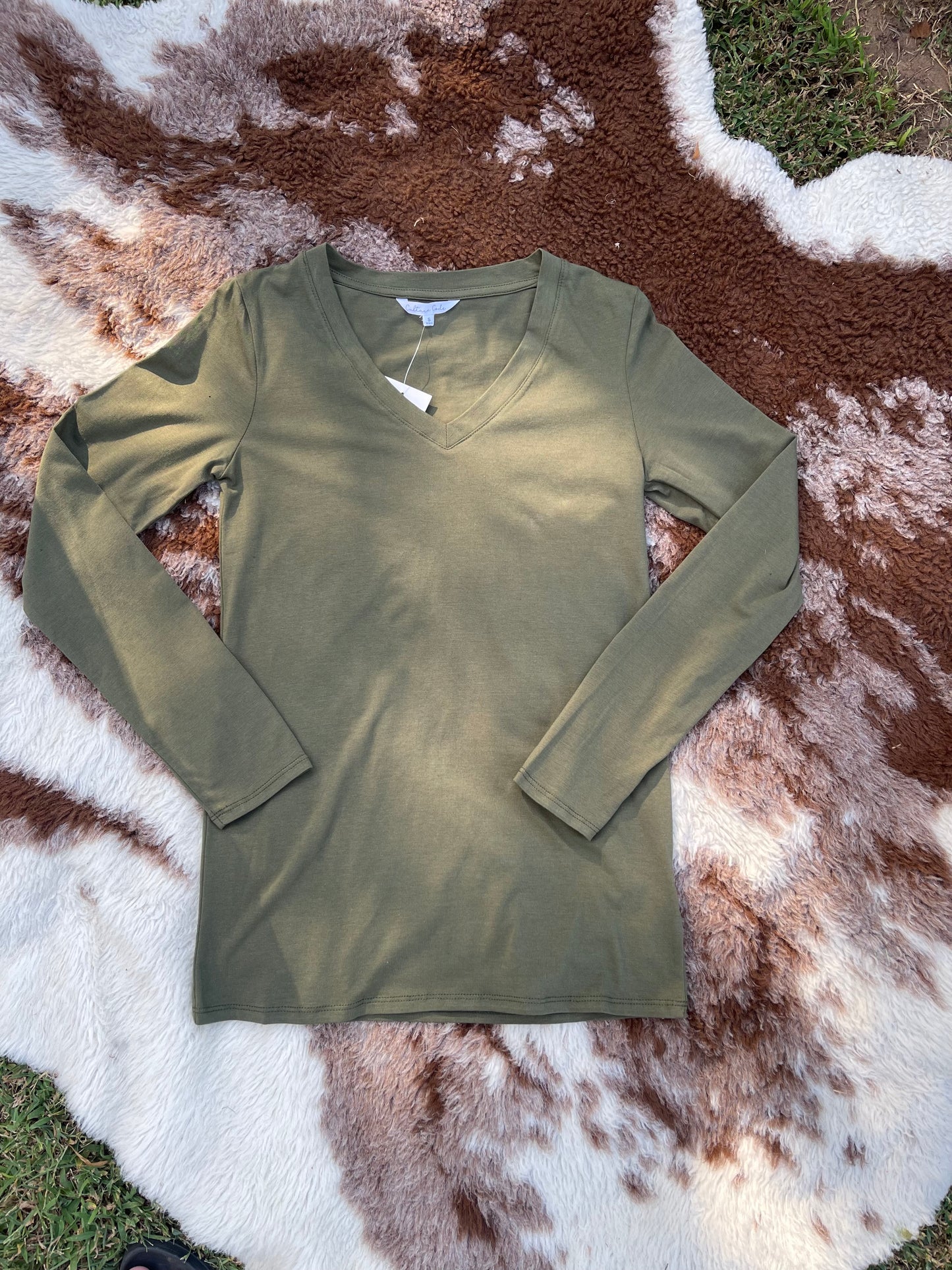 Olive colored long sleeve v-neck