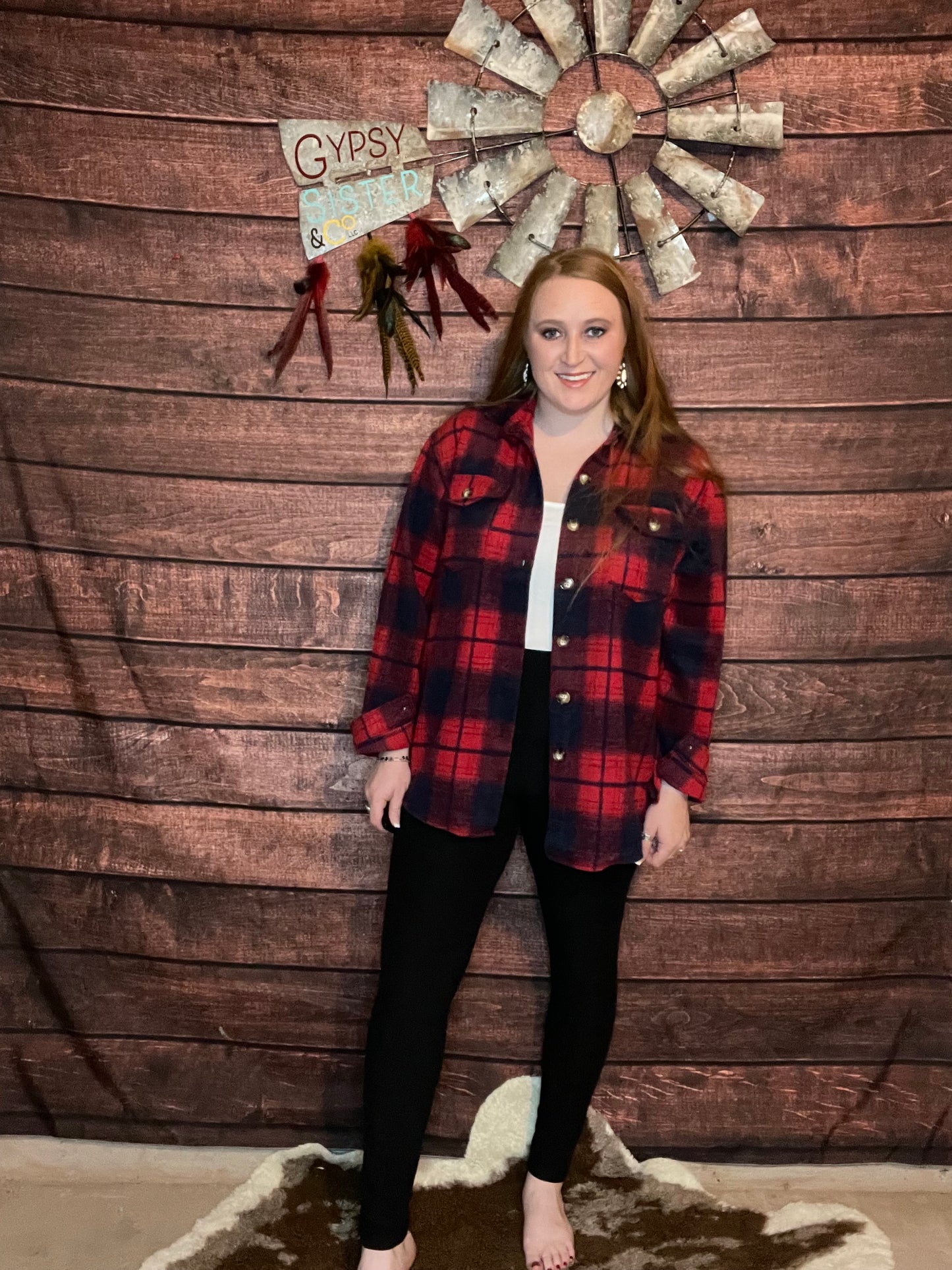 Model wearing Red Plaid Shacket with leggings