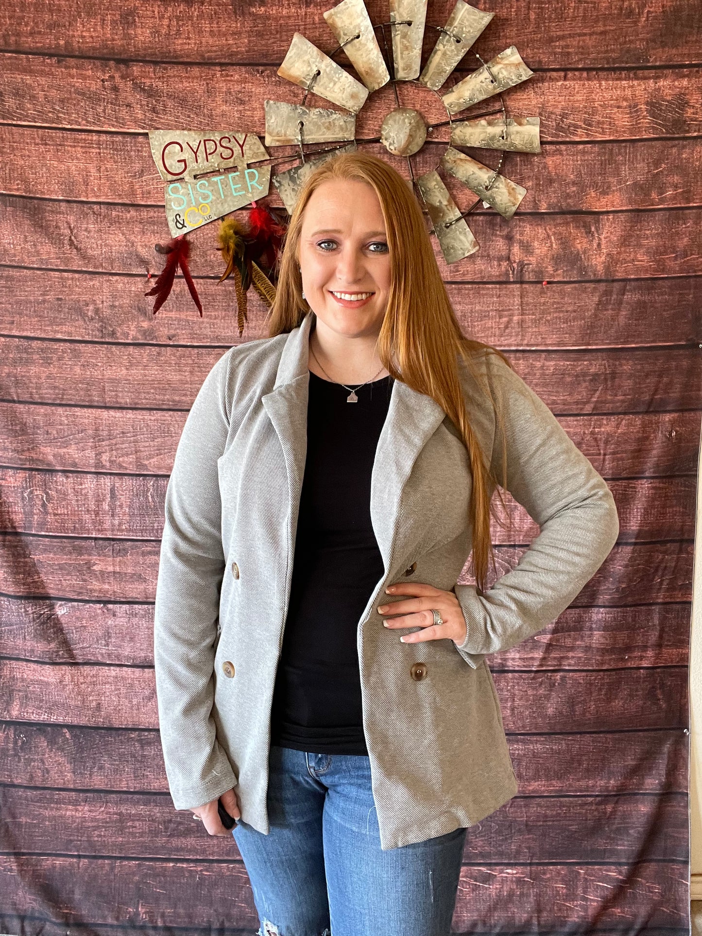 Model wearing Light Charcoal ribbed cotton blazer in size large