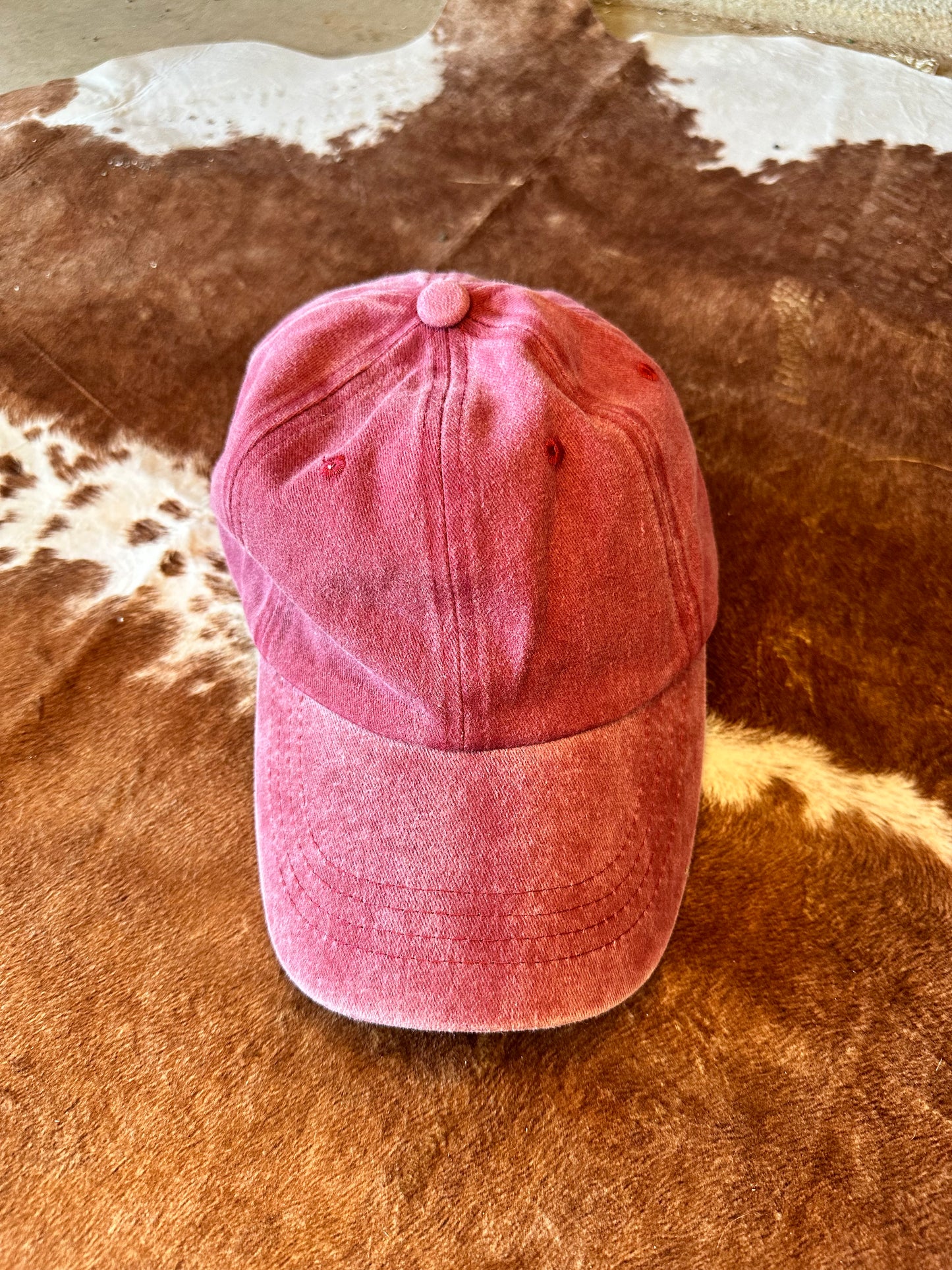 maroon ball cap