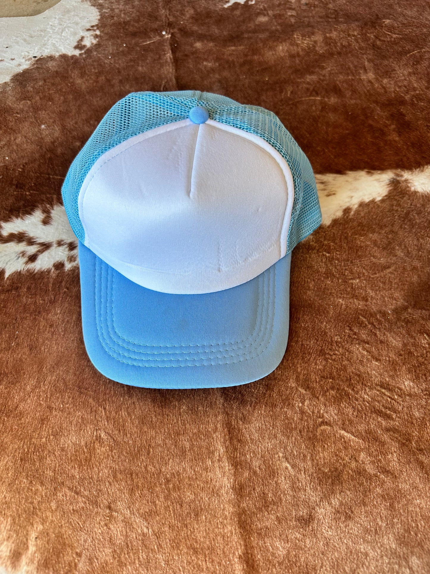 Light blue with white trucker hat