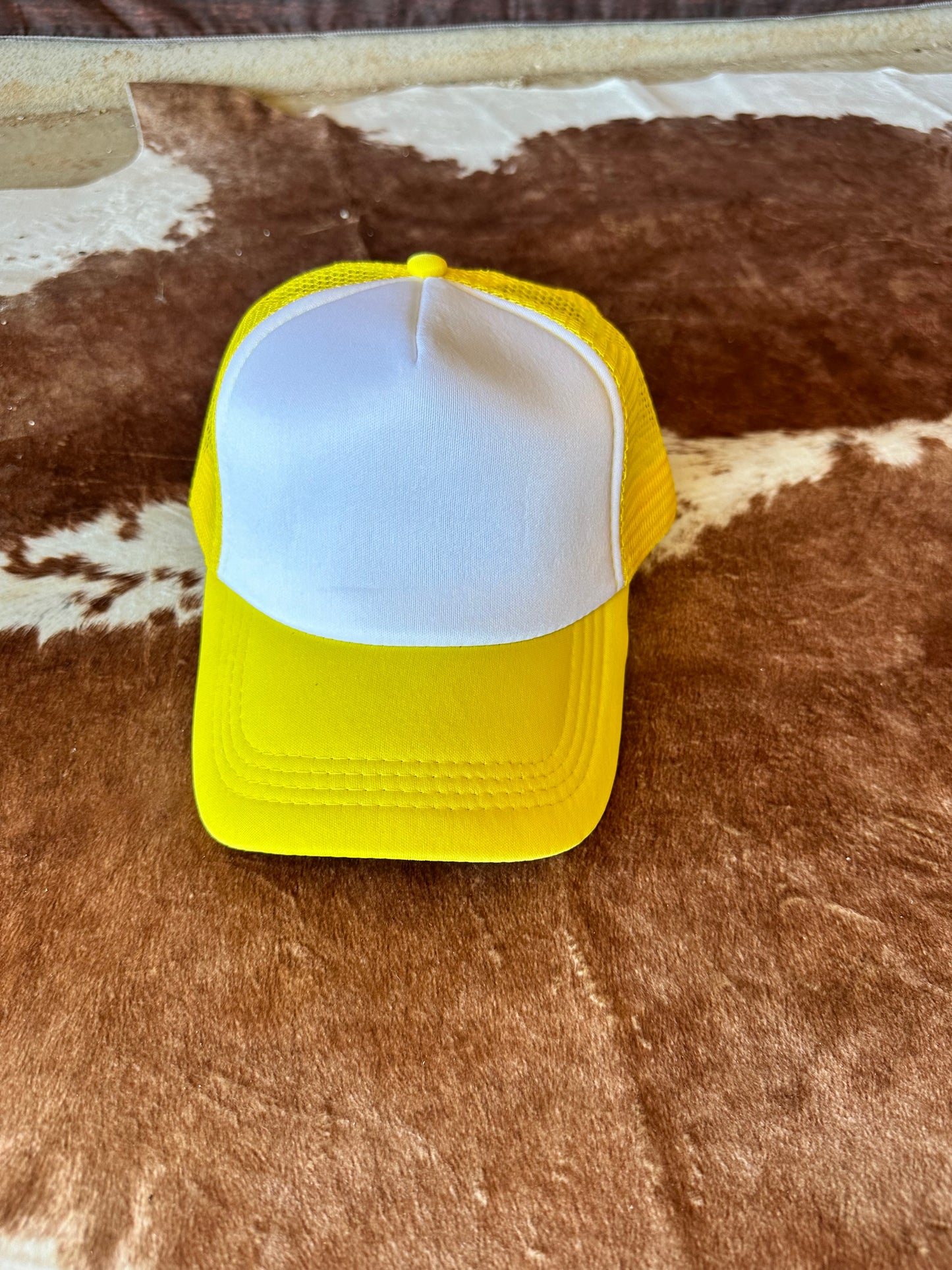 Yellow with white trucker hat