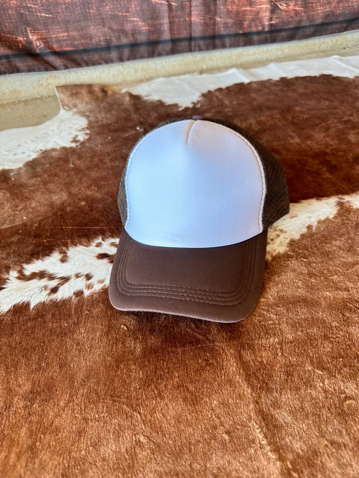 Brown with white trucker hat