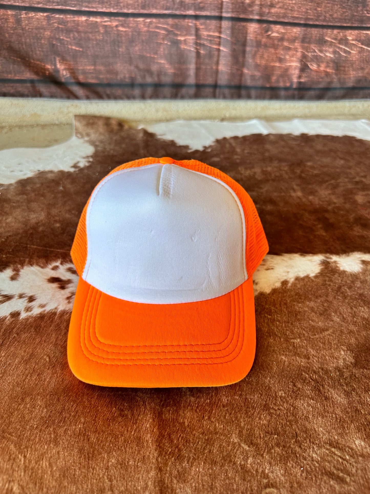 orange with white trucker hat