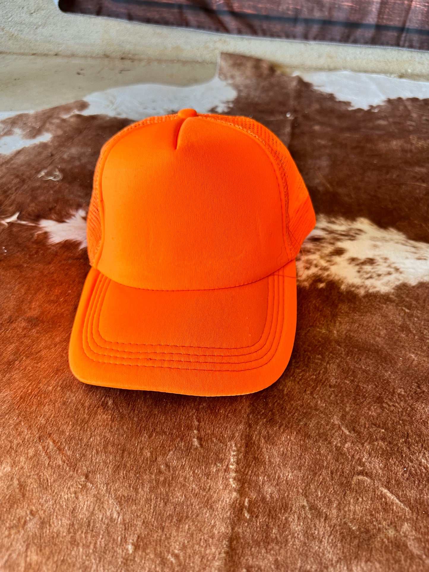 Solid orange trucker hat