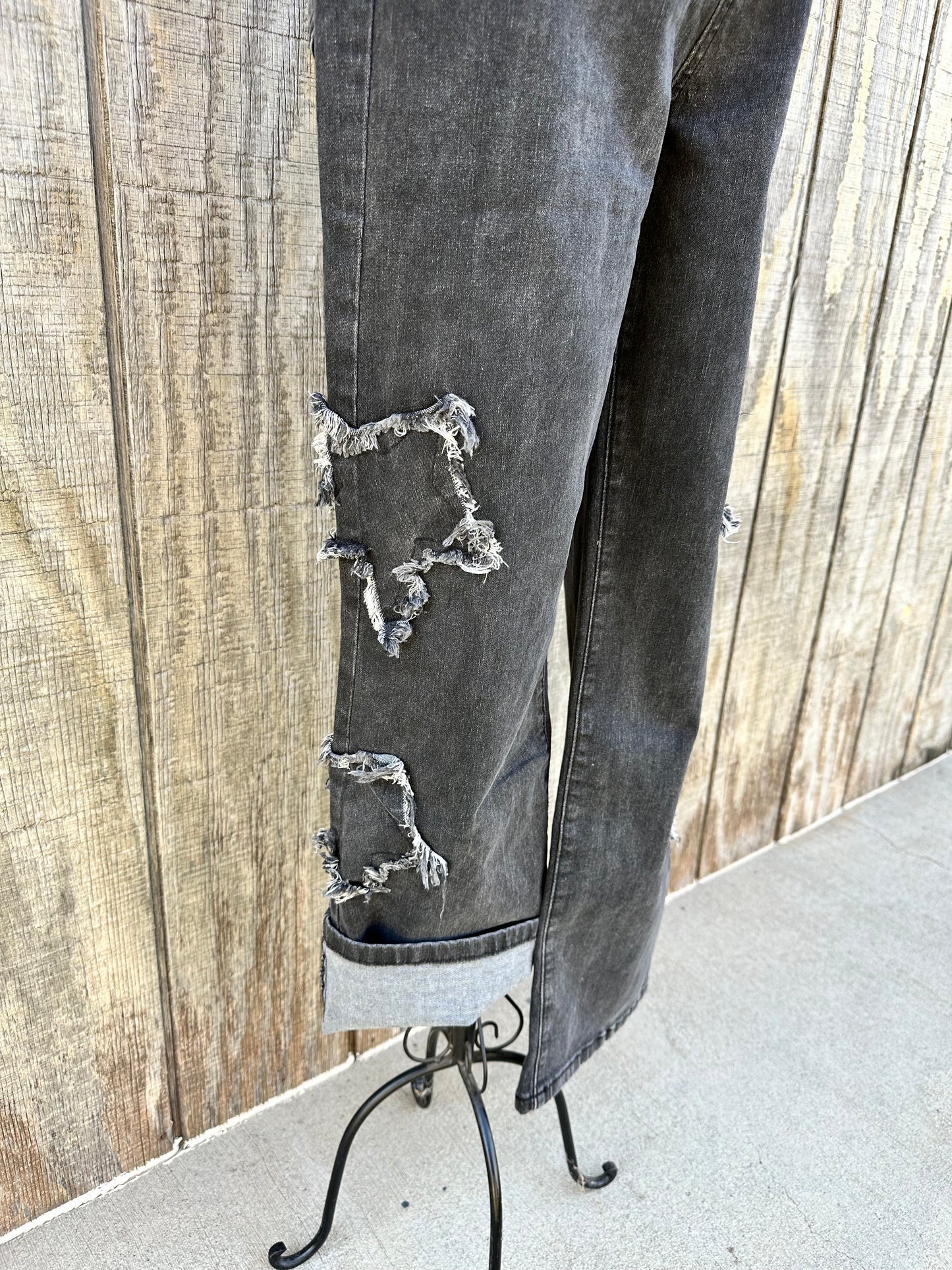 Close up of star patches on the right leg