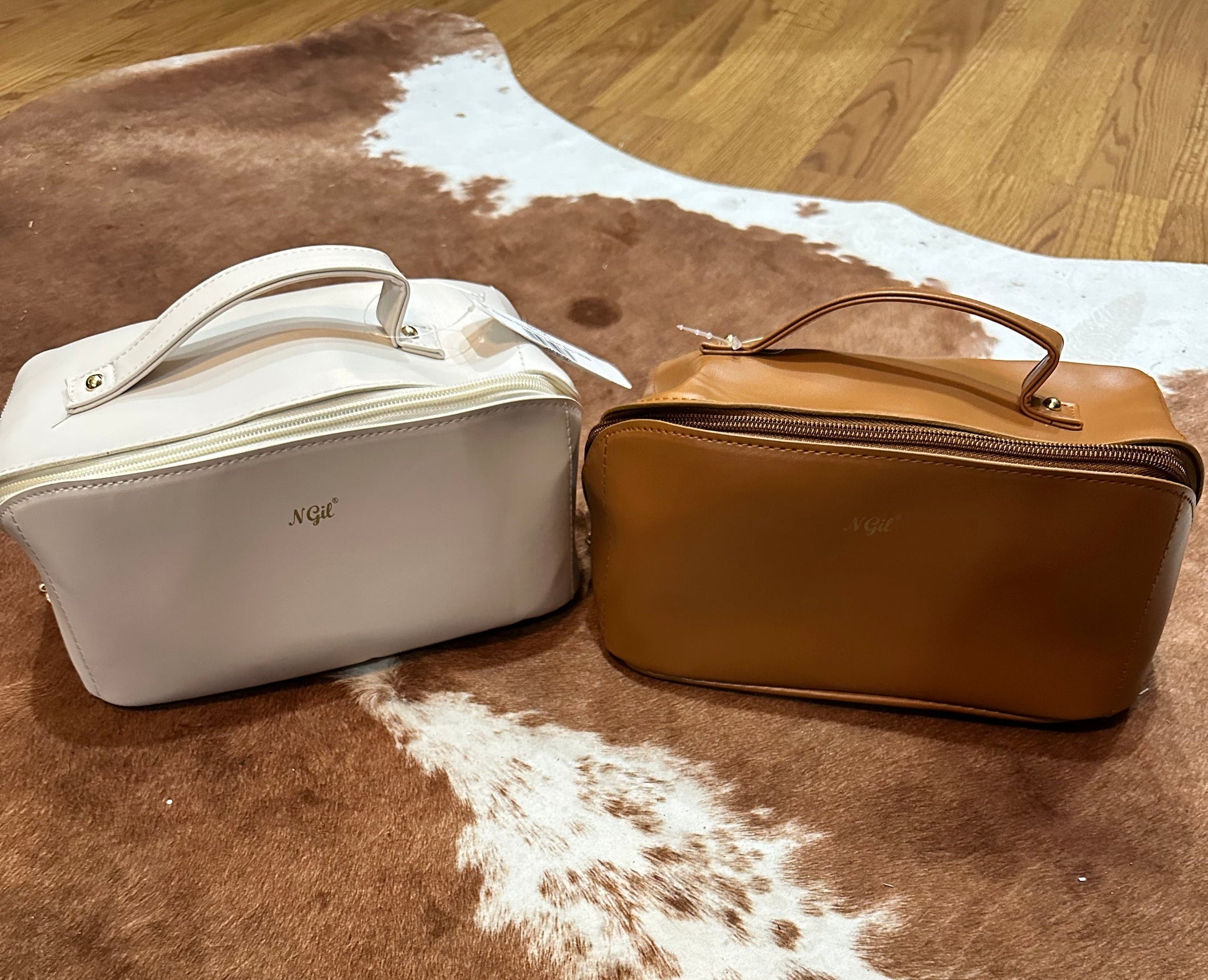 Brown and White faux leather travel bags