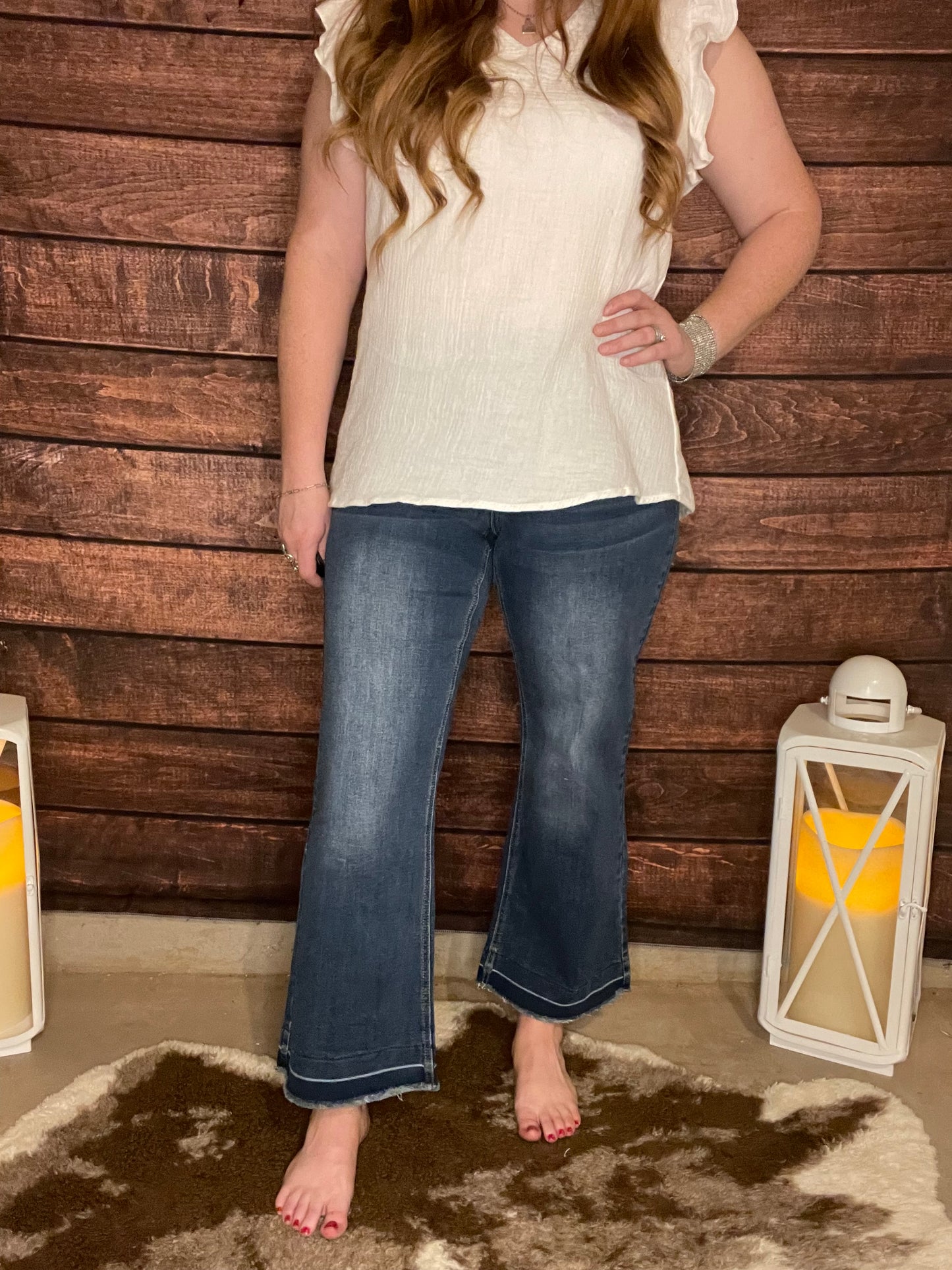 Model wearing size 8, mid-high rise, dark wash, wide leg denim capri pants