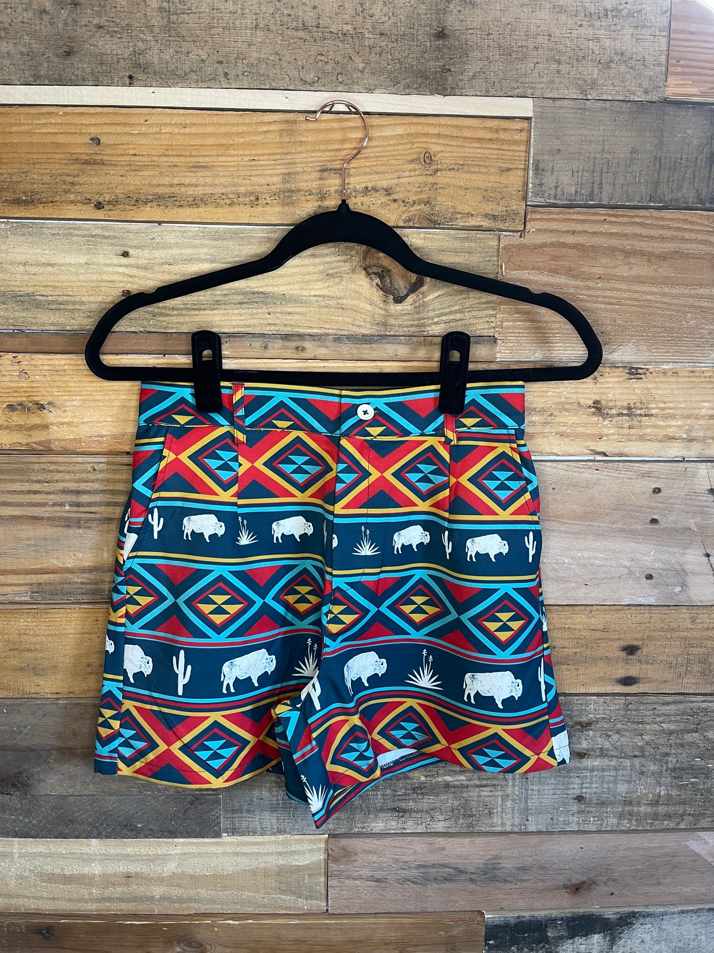 Tribal and Buffalo print shorts with navy blue, yellow, red, and white colors