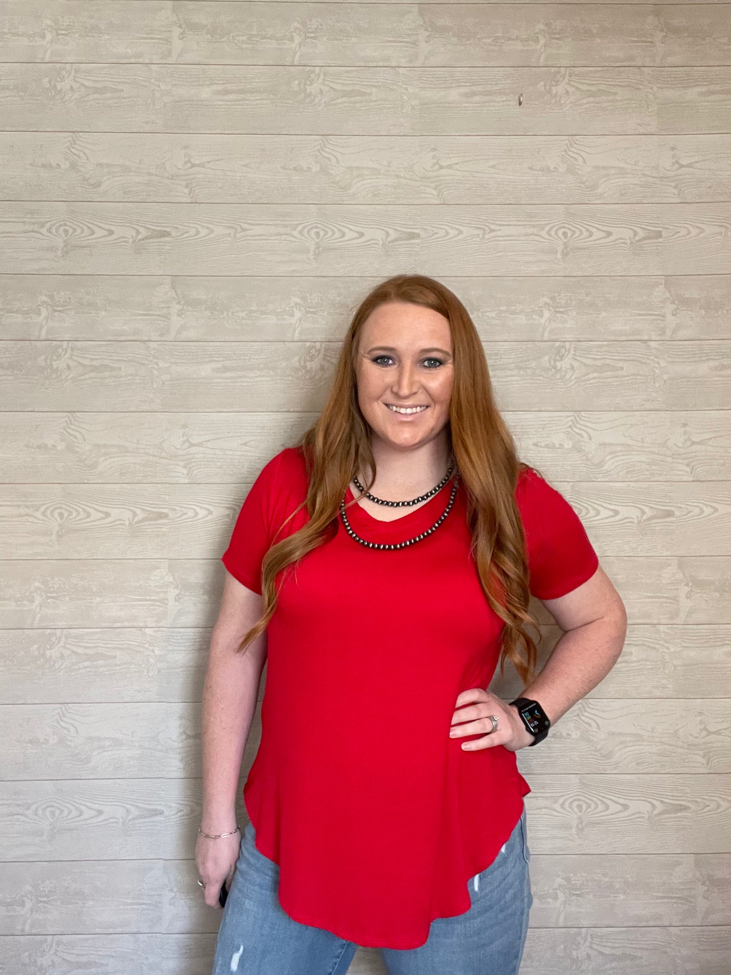 Model wearing Red plain v-neck t-shirt