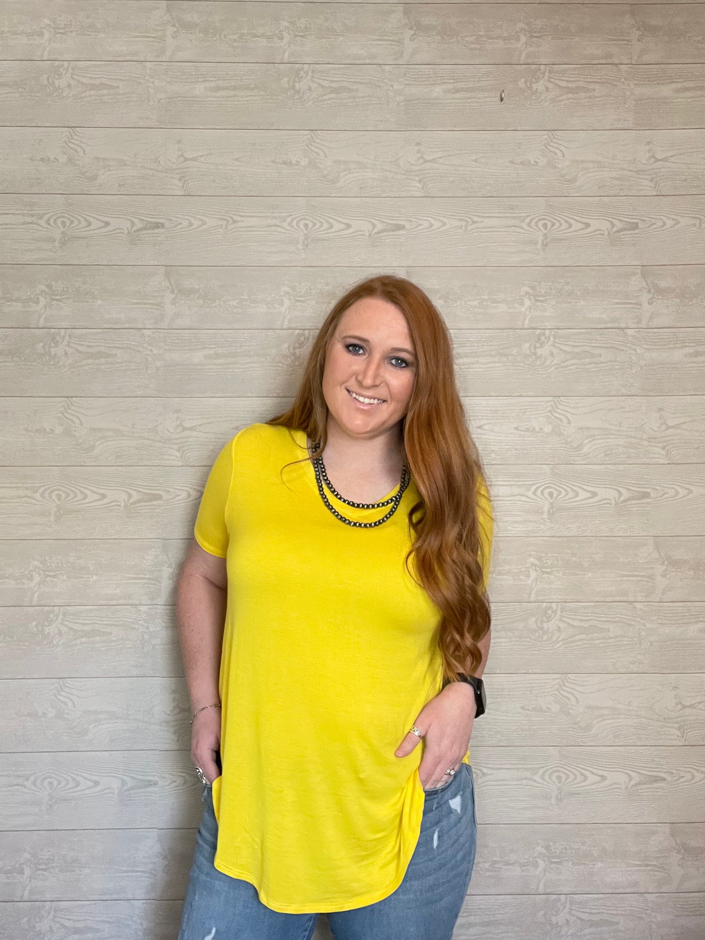 Model wearing Yellow v-neck t-shirt