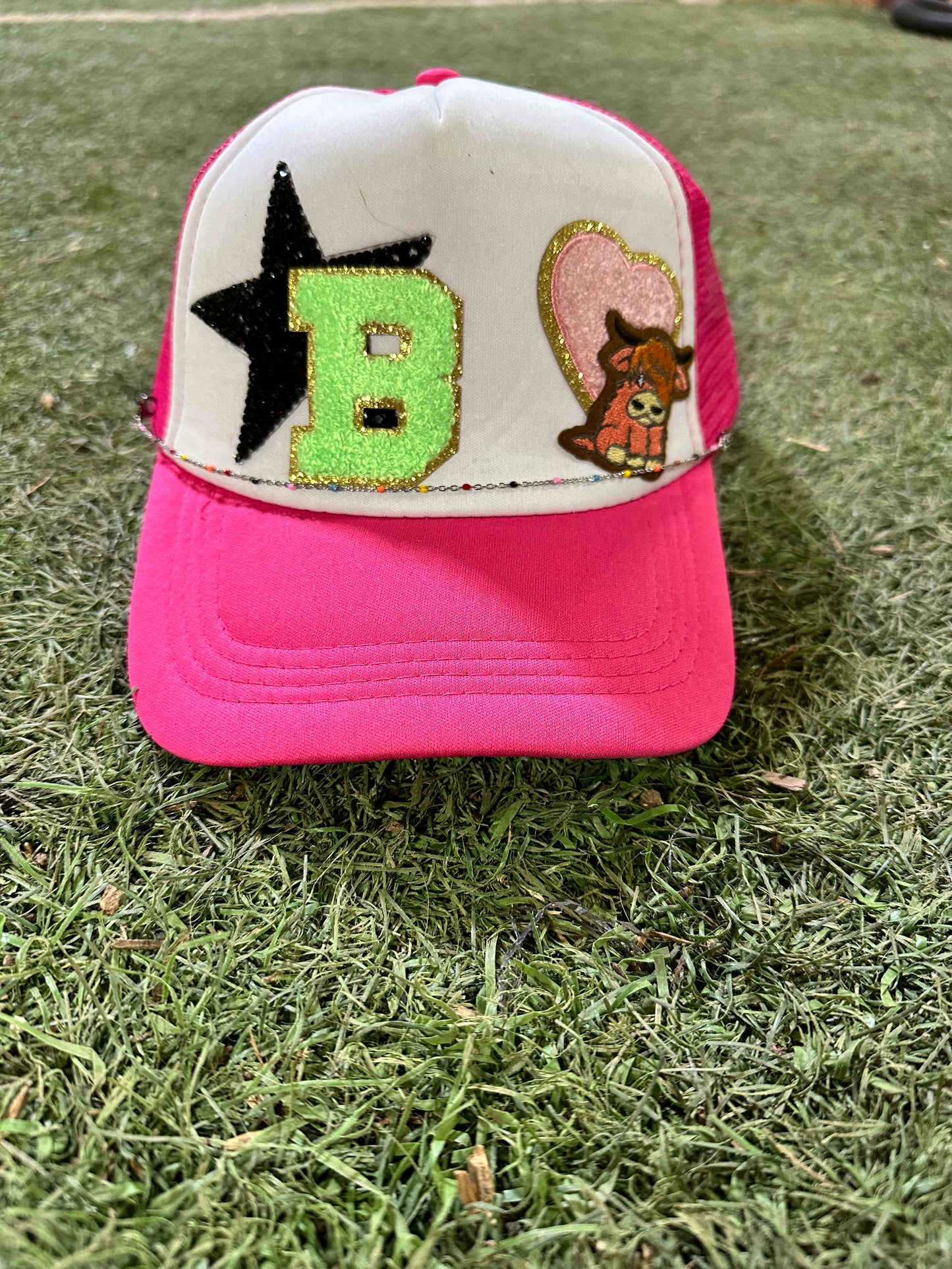 custom hat with 4 patches and a chain