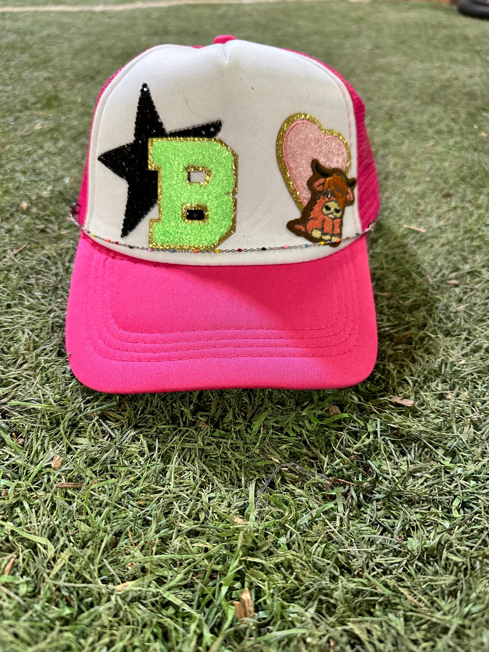 custom hat with 4 patches and a chain