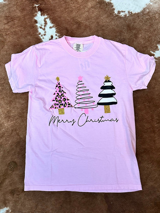 Light pink tee with three Christmas trees with words "Merry Christmas" 
