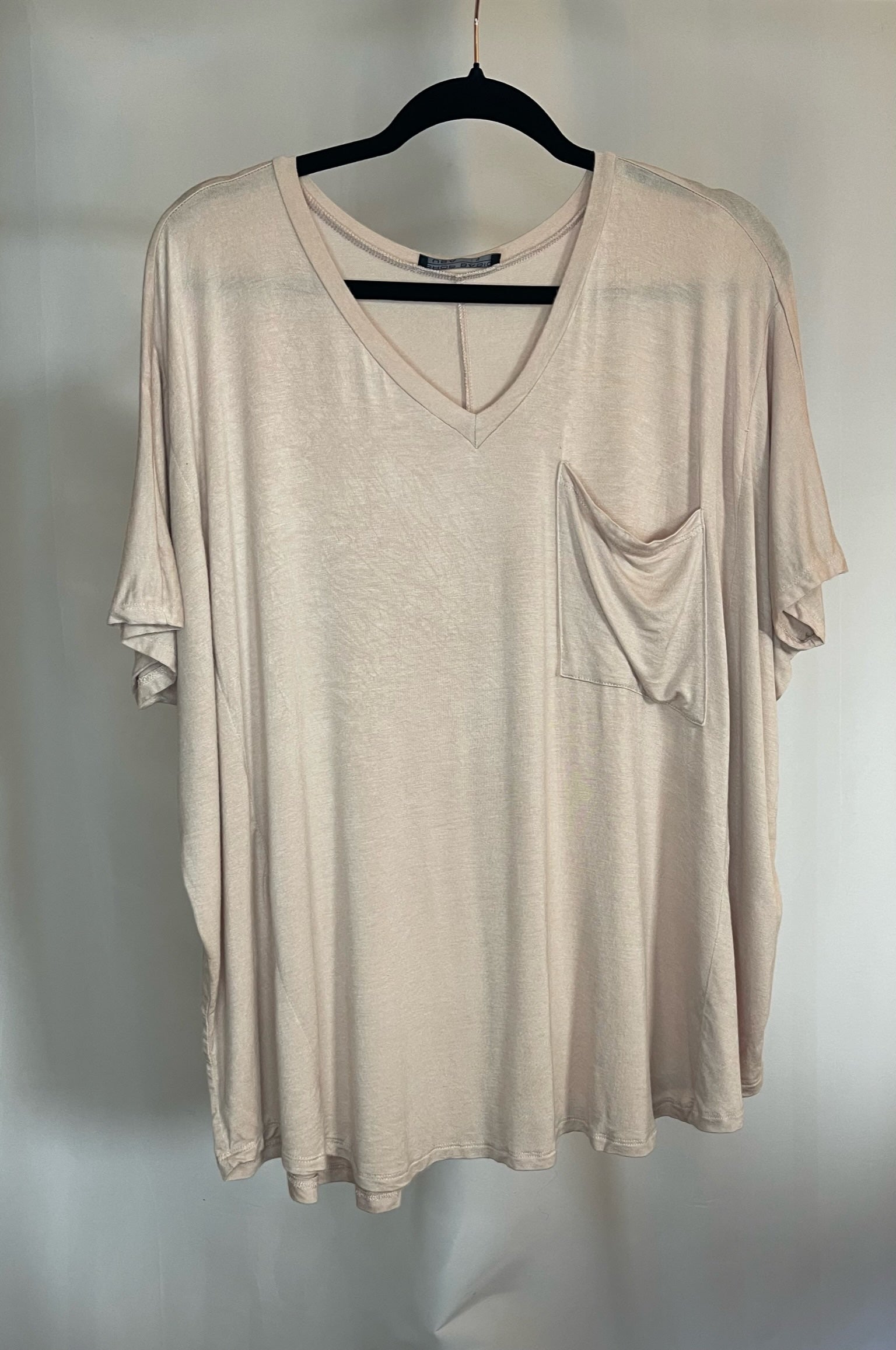 Oversized v-neck top with pocket in taupe