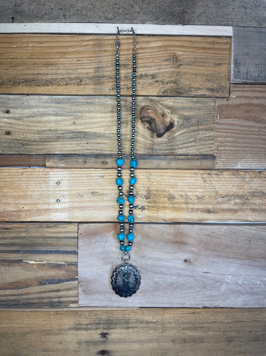 Navajo Pearl and turquoise stone necklace with silver concho