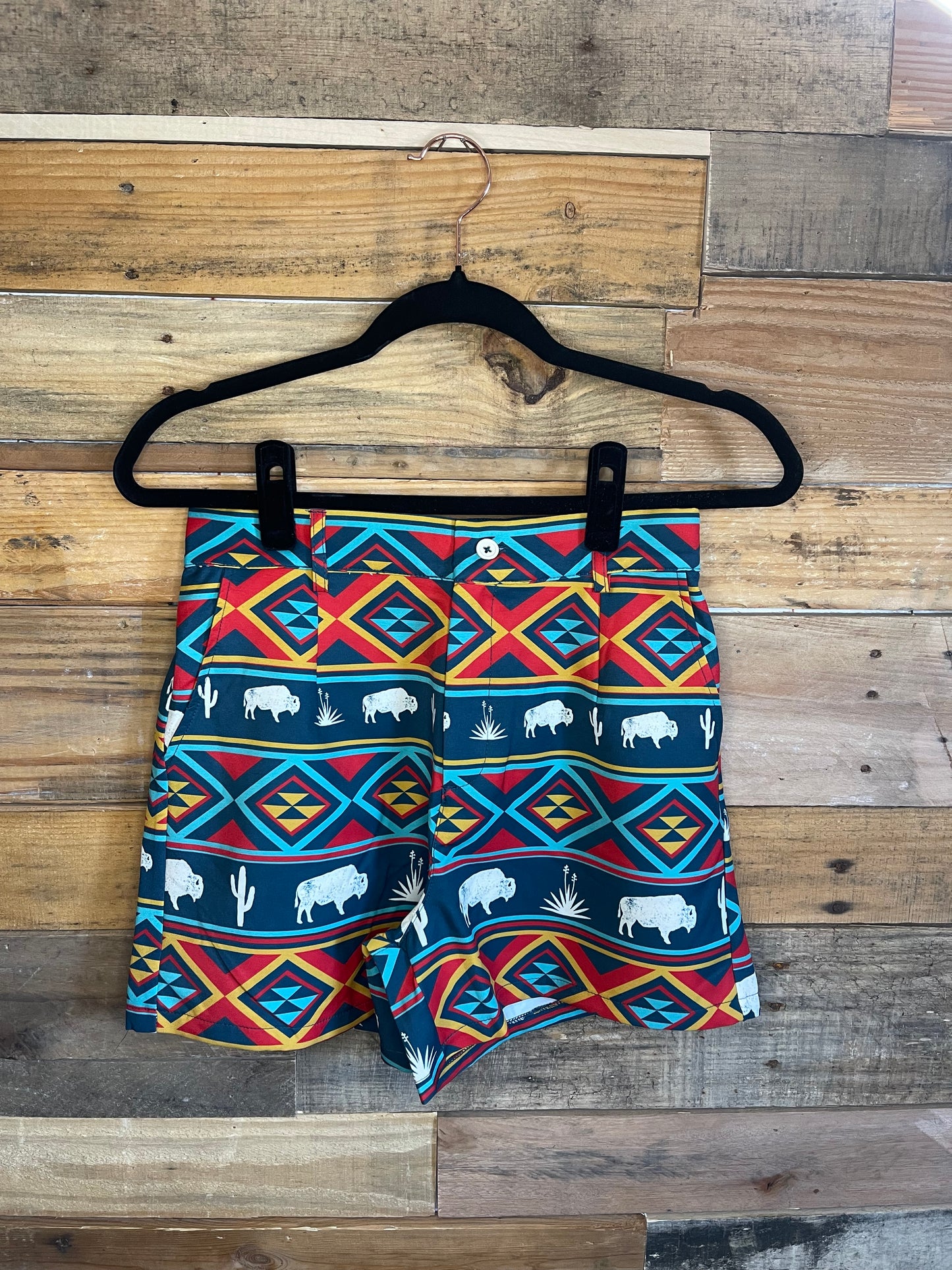 Tribal and Buffalo print shorts with navy blue, yellow, red, and white colors 
